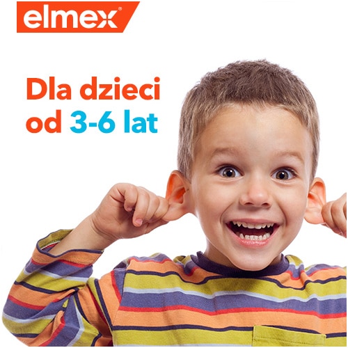 Uśmiechnięte dziecko pokazujące zdrowe zęby